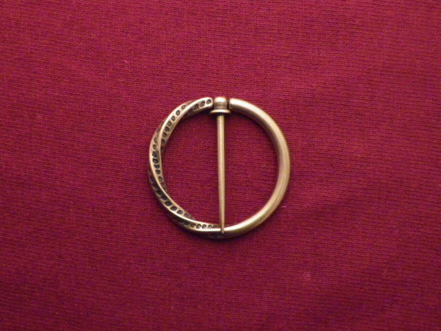 Half Twisted Punched Annular Brooch